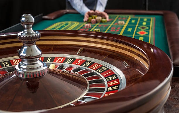 Mobile phone showing live roulette table interface